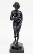 Grand Tour style bronze figure of the Venus de' Medici on a square slate base, 27cm high