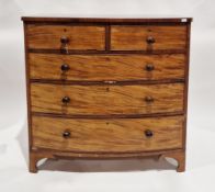 Early 19th-century mahogany bow-fronted chest of drawers comprising two short over three long
