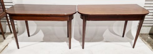 Two similar early 19th-century mahogany d-end tables, both on square tapering legs, 75cm high x