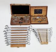 Two sets of Proto anti-slip professional combination spanners on racks (7-16mm and 17-24mm) and