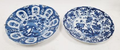 Two Chinese porcelain blue and white Qing dynasty plates, decorated in Kangxi style with lappet