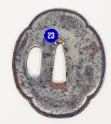 Japanese sword guard (Tsuba), Edo period, polished, with two apertures, decorated with stylised