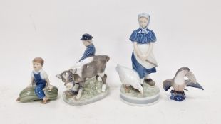 Four Royal Copenhagen porcelain figures or models, 20th century, printed marks, comprising: a figure