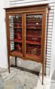 Edwardian mahogany and satinwood inlaid display cabinet, the two glazed doors later applied with