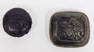 Japanese horn manju netsuke, Meiji period, carved in relief with two figures, the reverse pierced