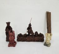 Chinese carved boxwood group of a fisherman before a bamboo raft, carved with birds and fish, a