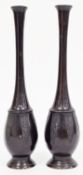 Pair of Japanese Meiji period bronze tall slender oviform vases, each with flared neck, case with