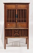 Chinese elm ' chicken coop ' kitchen cabinet, with panel and slatted doors opening to shelves, on