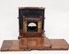 Late 19th / early 20th century mahogany and gilt-mounted folding plate camera with black leather