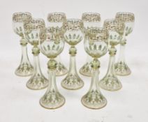 Set of nine Bohemian gilt and enamelled wine glasses in the style of Moser, late 19th century,