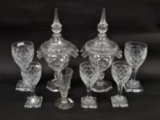 Collection of 20th century cut glassware, comprising: a pair of Regency style sweatmeat jars and