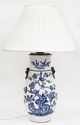 Chinese Qing dynasty blue and white crackle glaze baluster vase, with simulated bronze lion dog ring