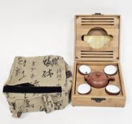Contemporary Chinese Yixing teaset, in bamboo presentation box and cloth holdall, comprising a
