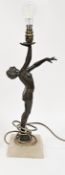 Art Deco bronzed spelter figural table lamp in the form of a semi-nude dancing lady, mounted on a