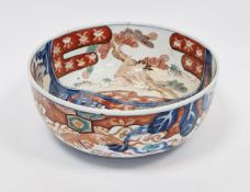 Japanese late Meiji period imari bowl, underglazed blue four character mark, painted with cranes,