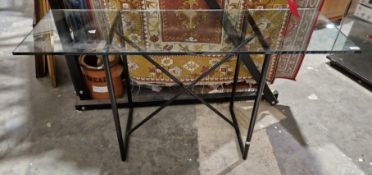 LOT WITHDRAWN - Contemporary Conran console table with glass top on a black tubular metal stand.