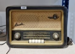Early 20th century Bush type VHF 61 radio in a brown bakelite case, 29cm high