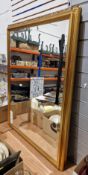 Two rectangular gilt framed wall mirrors with bevelled edge, largest 112cm x 84cm (2)