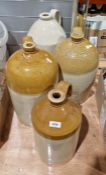 Four stoneware flagons, one impressed marks 'Richard W Johnson, Gloucester' and another with