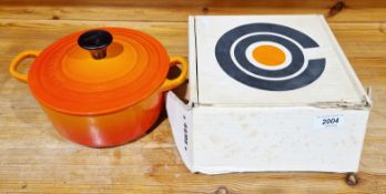Le Creuset orange cast iron small casserole in original box Additional photos uploaded. Diameter
