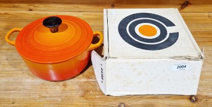 Le Creuset orange cast iron small casserole in original box Additional photos uploaded. Diameter