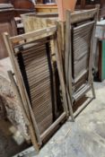 Pair of teak folding garden deckchairs with wooden slatted seats, 58cm wide (2)