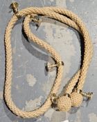 Rope stair banister with five brass fittings, approx 3m long