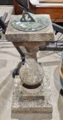 Reconstituted stone sundial, the metal dial on a baluster support and square stepped base, 77cm high