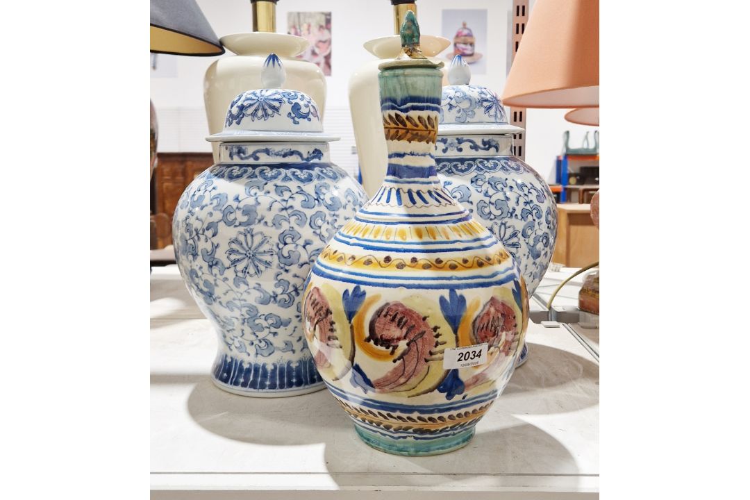 Pair of modern Chinese blue and white ginger jars and covers and a Moroccan style fez pottery bottle