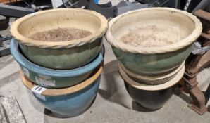 Six glazed garden plant pots, all of circular form, largest 37cm diameter (6)