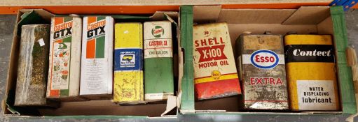 Eight vintage motor oil and lubricant cans including Esso Extra, Connect, Castrol GTX, Shell X100,