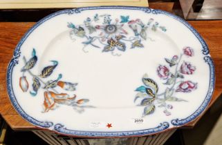 Large early 19th century meat plate by Wood & Brown decorated in a botanical pattern, 56cm wide