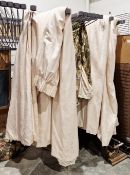 Two large pairs of cream lined curtains, approx 270cm drop x 490cm wide and a pair of lined curtains