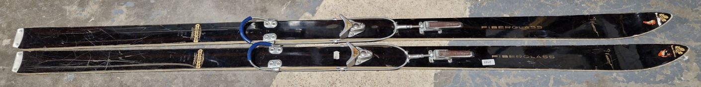 Pair of A Rossignol fibre glass skis