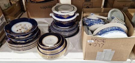 Early 20th century George Jones part dinner service decorated with a colbalt blue and gilt border,