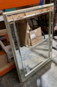 Modern rectangular wall mirror, the bevelled plate surrounded by eight bevelled mirrored panels,