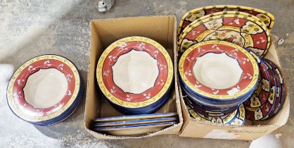 Quantity of modern tableware painted with flowers in rust, yellow and green design, comprising