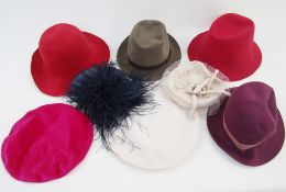 A collection of various felt hats, and others, and Aran knitted scarf with Aran mittens and an
