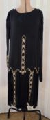 A crepe and chiffon black dress labelled Edwin Powell & Son Shrewsbury, embroidered in cream