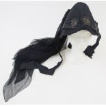 Victorian mourning poke bonnet, black brocade and a brocade trim, black ribbon ties, attached is a