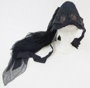 Victorian mourning poke bonnet, black brocade and a brocade trim, black ribbon ties, attached is a