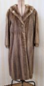 A vintage pastel mink coat, cuffed sleeves, button detail to the cuffed sleeves, button detail to
