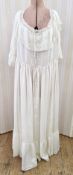 Edwardian silk nightgown with lace detail, with silk ribbon threaded through the waist and the
