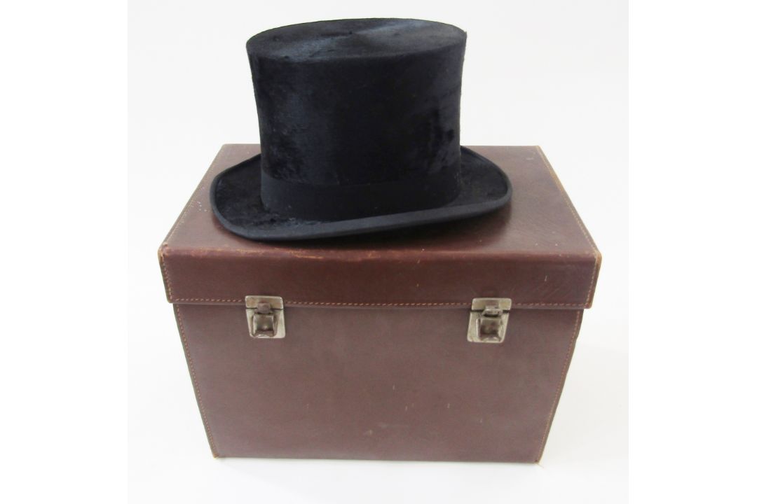 A silk top hat labelled Tress & Co. London with its original leather fitted case, internal - Image 1 of 2
