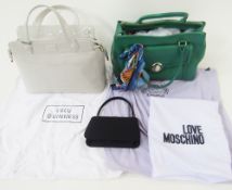 Lulu Guinness patent leather handbag, zip fastening with 'lipstick' charms on the two way zip, inner