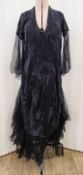 Early 20th century black evening dress, heavily embellished with black bugle beads and faux jet