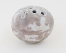 Alan Wallwork (1931-2019), a stoneware small pod shaped vessel, pierced with circular apertures,