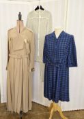 A Louis Feraud pale brown dress, pleated skirt, breast pockets, trimmed with satin, the cuffs also