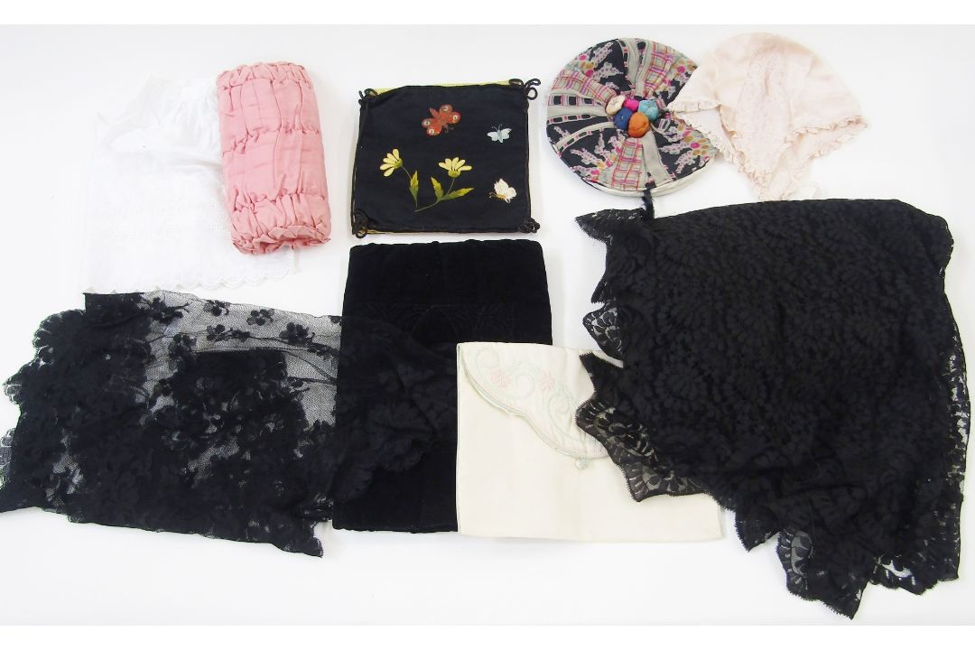 A vintage black lace shawl, a large length of black lace with scalloped edge possibly a shawl or a - Image 1 of 6