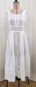 Two Victorian petticoats, one heavily embroidered in whitework daisies and knot decoration, and